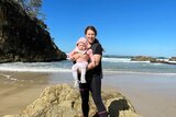 Sarah and baby daughter at the beach