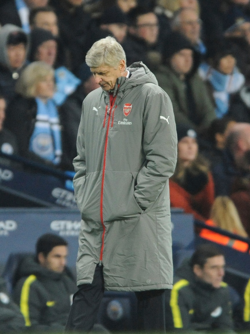 Arsene Wenger looking disappointed during loss to Manchester City