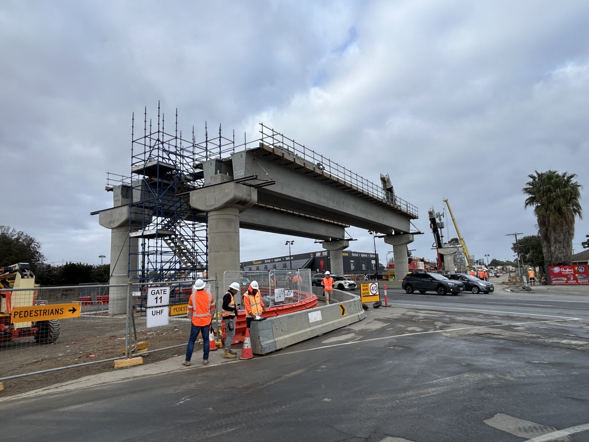 Signs of progress as Marion Road tram overpass towers over traffic ...