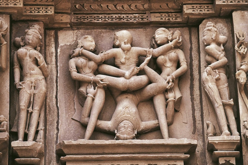 Erotic statues on Kandariya Mahadeva temple, Khajuraho Group of Monuments.