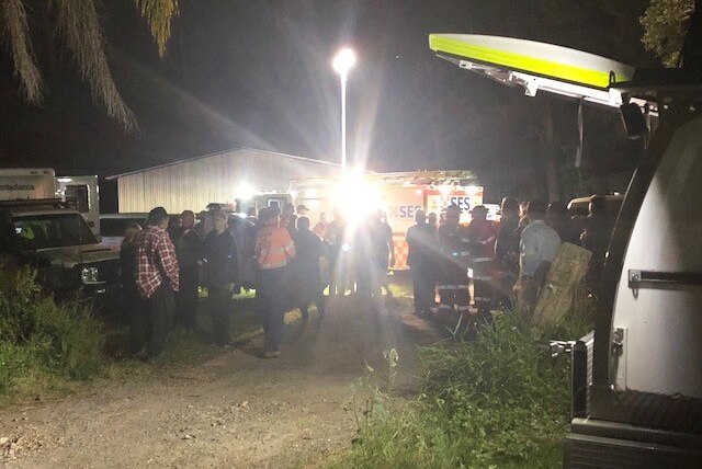 Police, State Emergency Service and other volunteers arrive at the property to join the search.