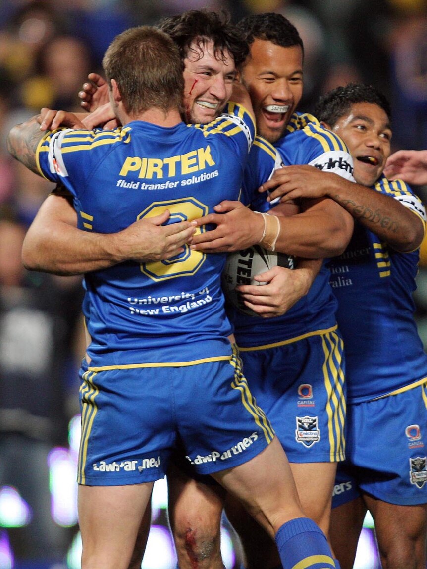 The Eels celebrate a Hindmarsh try