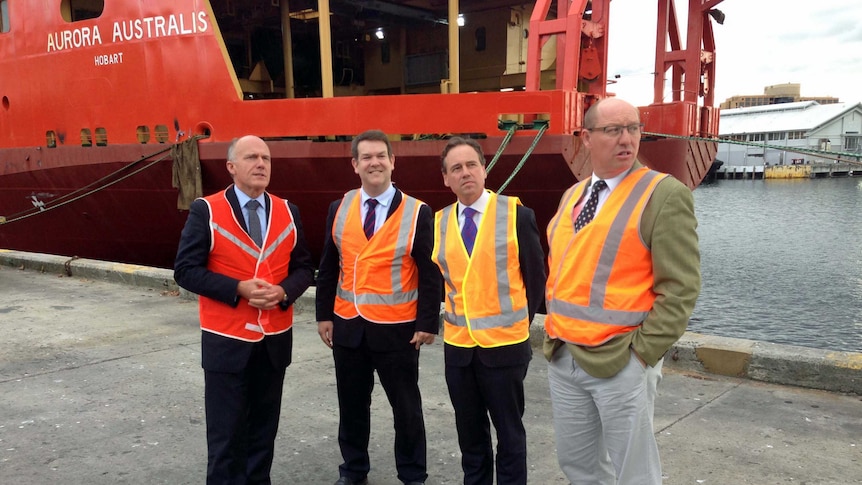 Liberal MPs Eric Abetz, Matthew Groom, Greg Hunt and Eric Hutchinson inspect Aurora Australis.