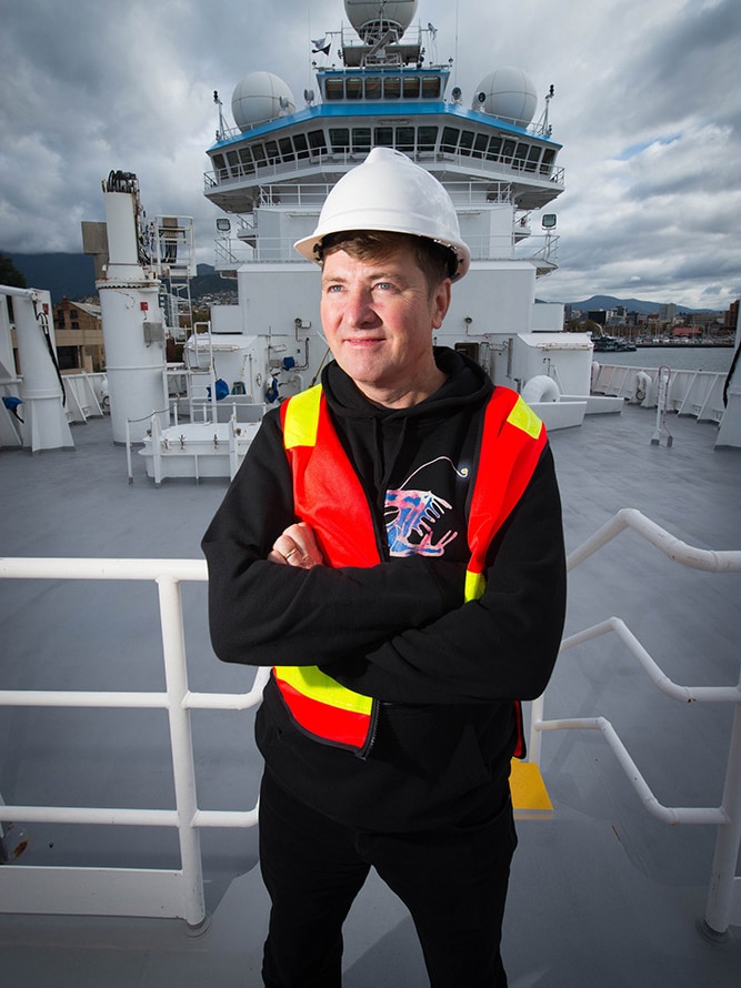 Dr Tim O'Hara on the deck of the Investigator.