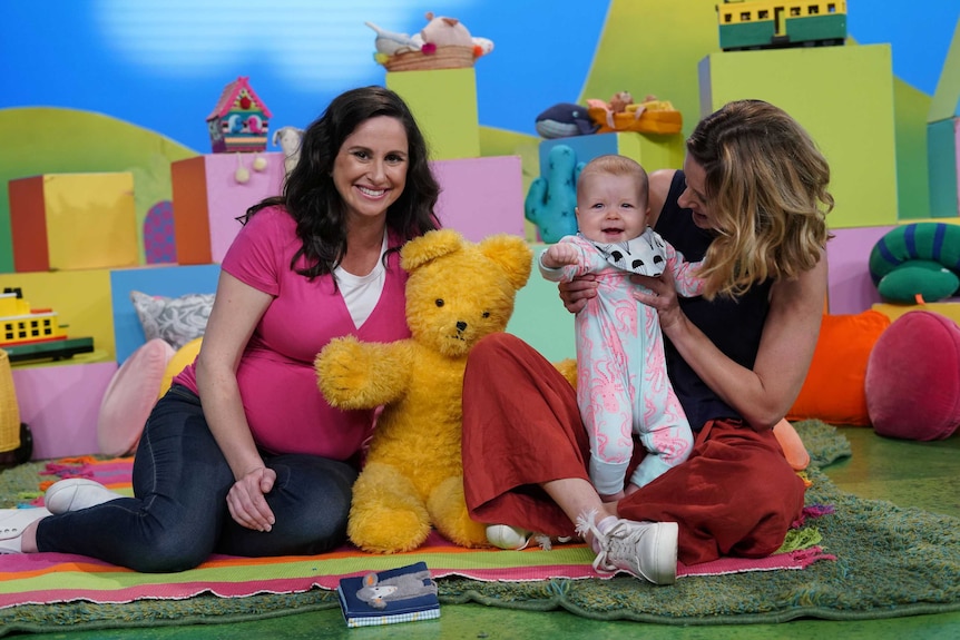 The Play School team with a baby on the episode about beginnings and endings.