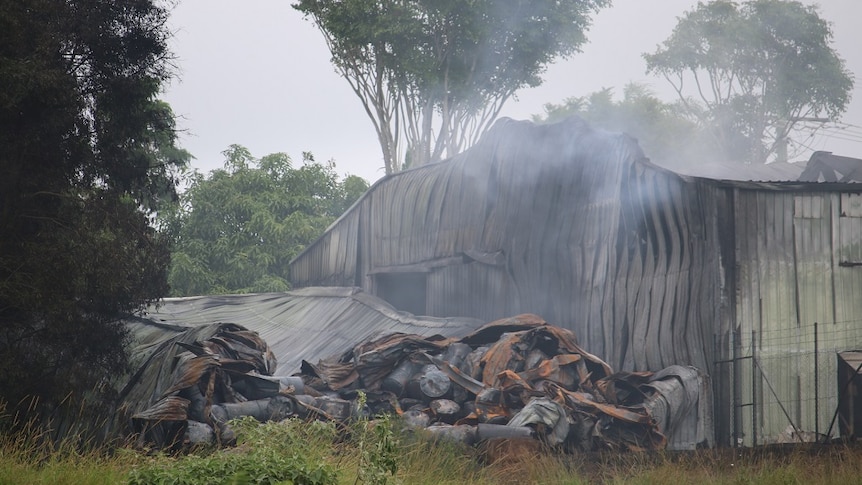 The damage to the rear of the macadamia oil factory.