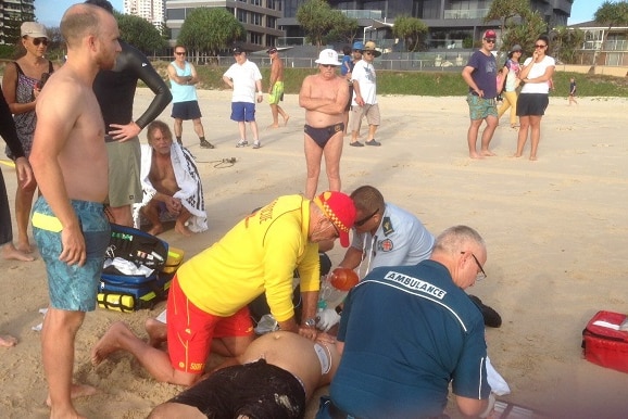 Veteran lifesaver Peter Anderson performs CPR