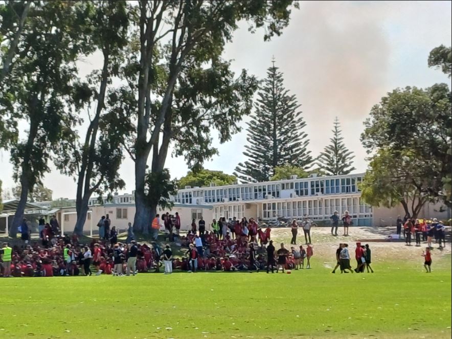 Students at Esperance Senior High School evacuated to the school oval due to a bushfire burning nearby. 