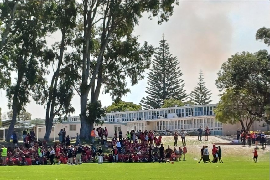 Students at Esperance Senior High School evacuated to the school oval due to a bushfire burning nearby. 