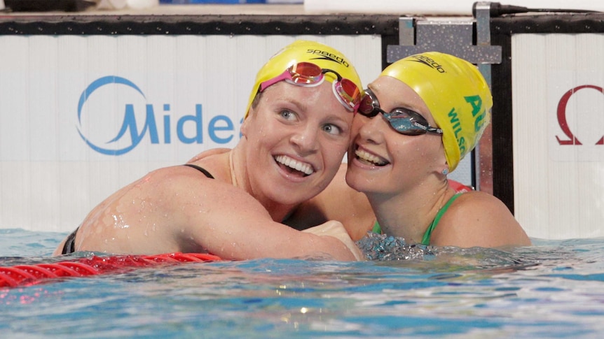 Australia's Emily Seebohm (L), Madison Wilson win gold, silver in 100m backstroke at world titles.