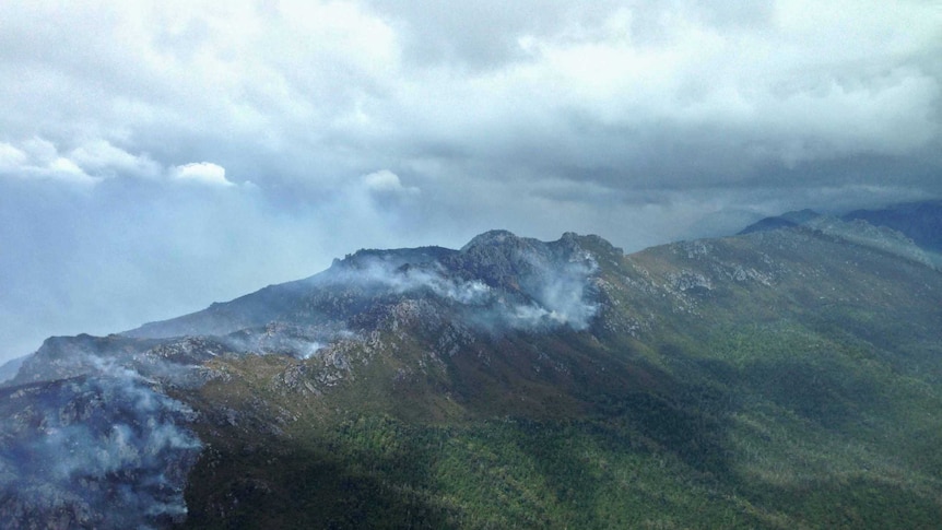 A fire front burns down face of Mount Maconochie in the south-west wilderness area.