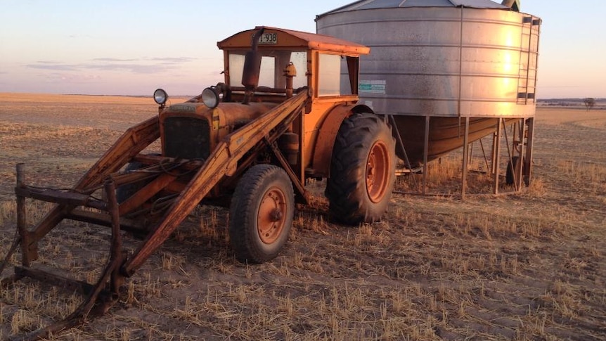 Old tractor and silo