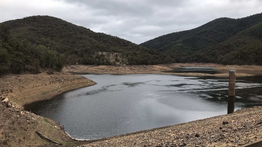 landscape shot of a body of water in rural terrain