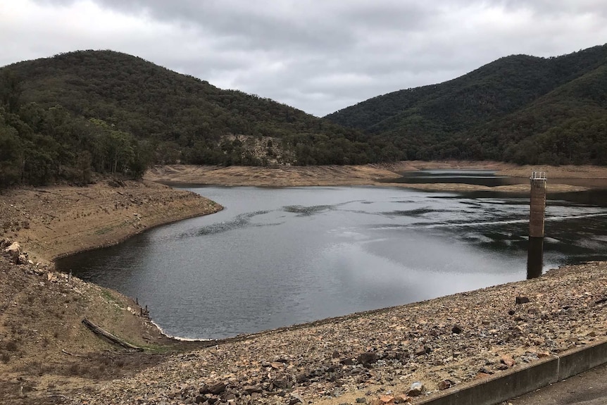 landscape shot of a body of water in rural terrain