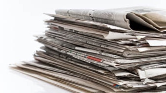 Stack of newspapers (Thinkstock: Getty Images)