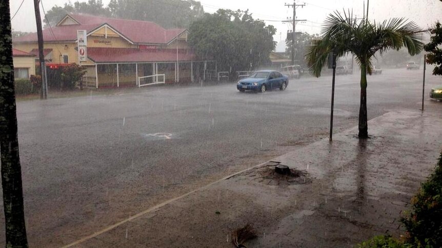 Rain buckets down in Cooktown in far north Queensland ahead of the arrival of Cyclone Ita.