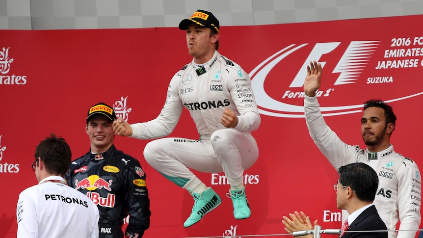 That winning feeling ... Nico Rosberg celebrates on the podium after claiming the Japanese Formula One Grand Prix