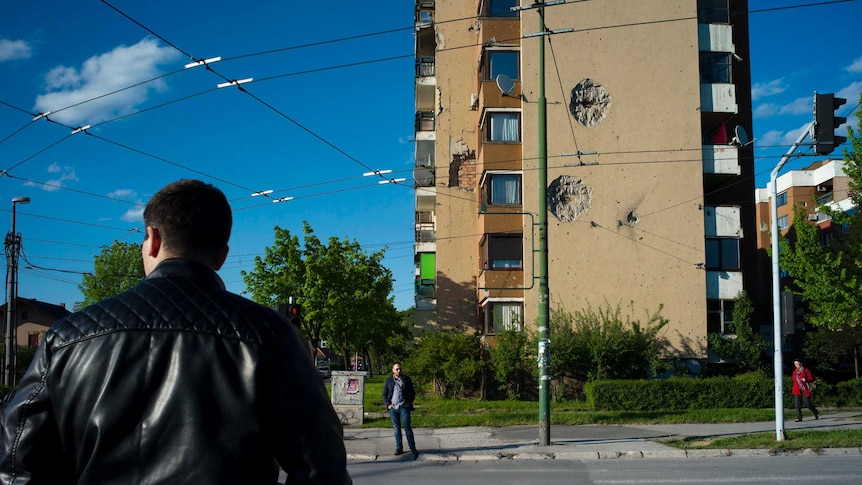 In Sarajevo, shell damage sustained during the city's marathon siege by Bosnian-Serb forces is still visible.