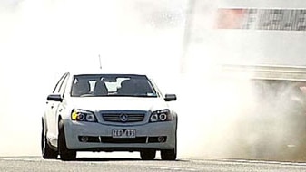 Truck swerves to avoid Tony Abbott's car (ABC News)