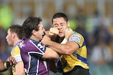 Face off ... Billy Slater (L) and Jarryd Hayne go at it last Friday night