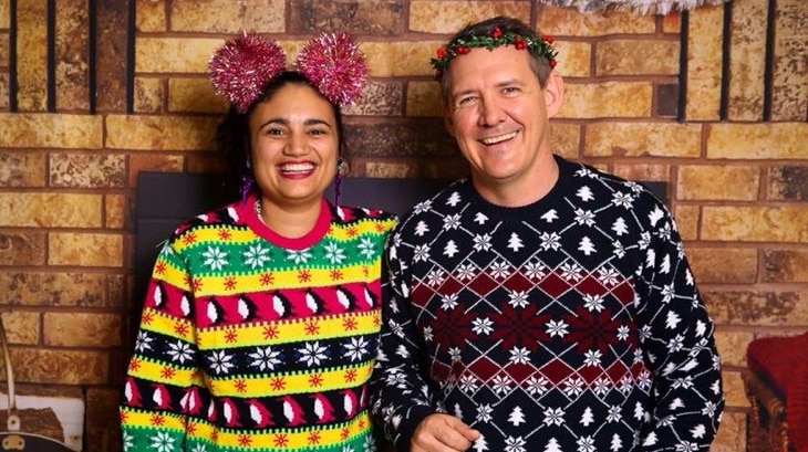 NT Tourism Minister Lauren Moss and Chief Minister Michael Gunner in festive Christmas jumpers