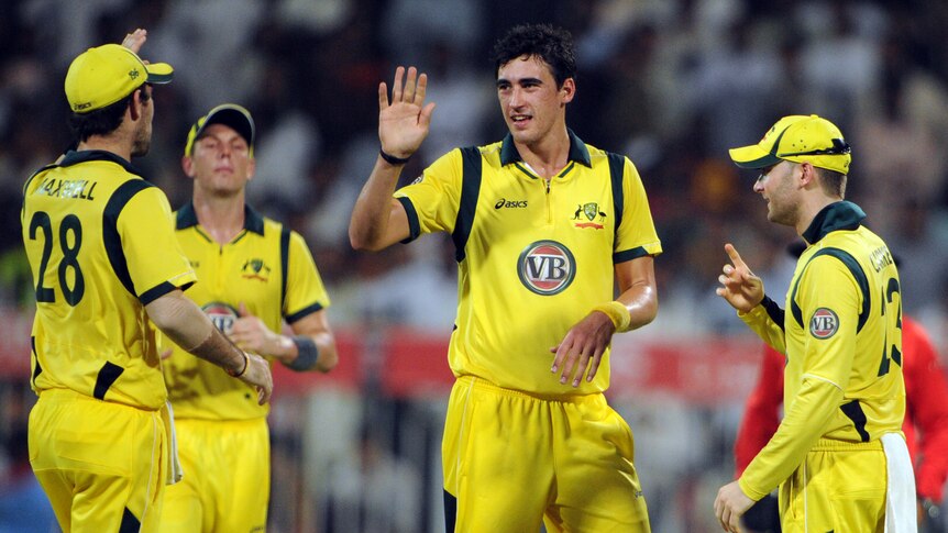 High-five for Starc