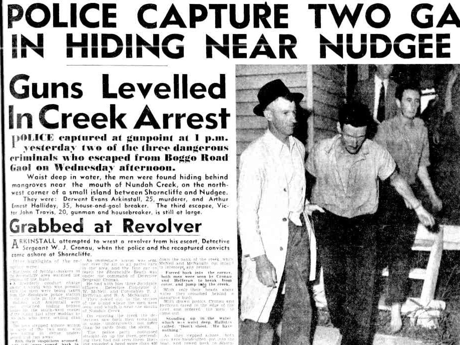 An old news article discussing the re-capture of prison escapees.