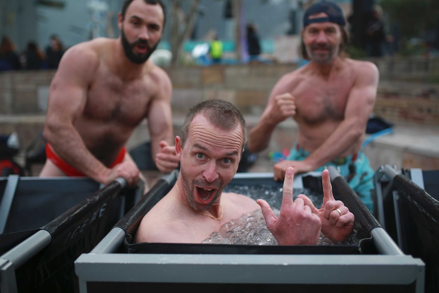 Ben Anderson in a bucket of ice in Federation Sq