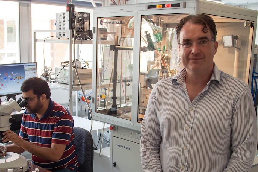 Jack Clegg with a fellow UQ molecular researcher
