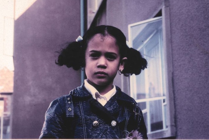 A little girl in pigtails