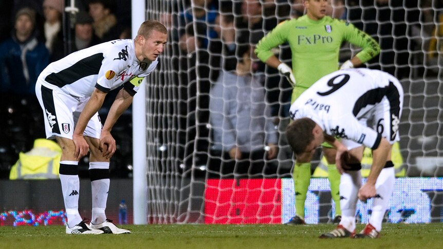 Fulham defenders looking upset after Europe loss