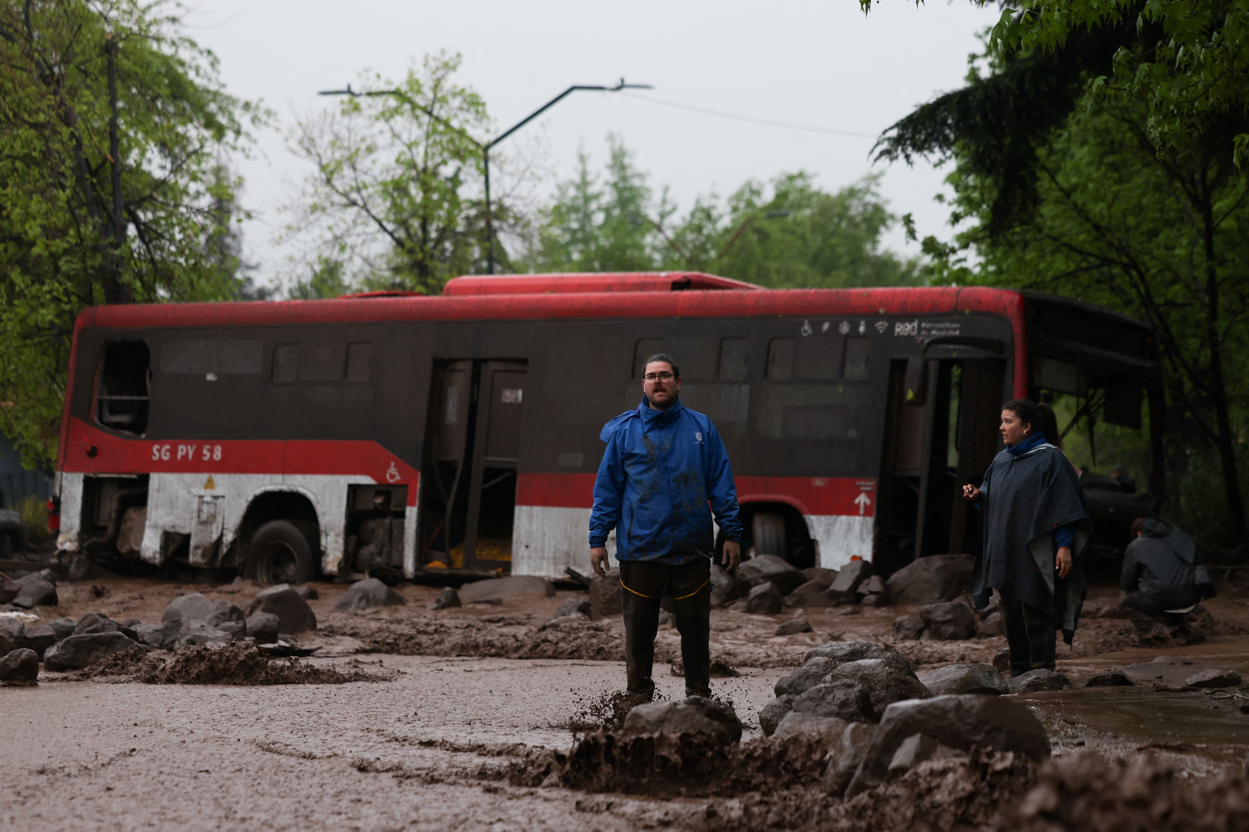 Chile declares disaster after flash floods wash away vehicles and trap people