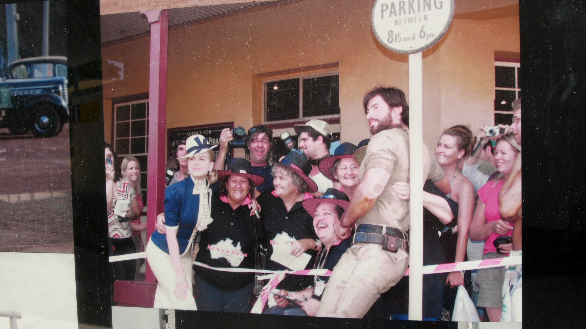 Actors Nicole Kidman and Hugh Jackman pose with a group of fans