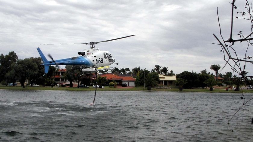 A FESA Helicopter takes on a load of water