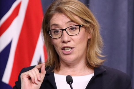 WA Transport Minister Rita Saffioti standing at a lectern at a press conference announcing the levy.