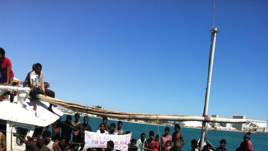 Asylum seekers arrive by boat in Geraldton in April 2013