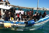 Asylum seekers arrive by boat