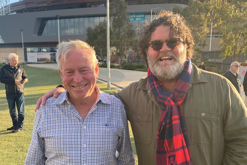 Russell Woolf and Colin Barnett smiling.