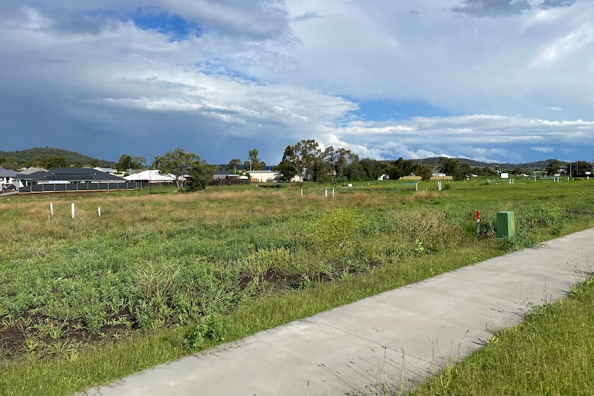 Rain clouds building over vacant home site in Toowoomba. 