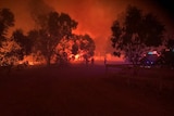 Red flame sky at the scene of the Eagle Bay bushfire.
