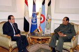 Field Marshal Mohamed Tantawi (R) has vowed to give Mr Ganzouri (L) the prerogatives to lead the country.