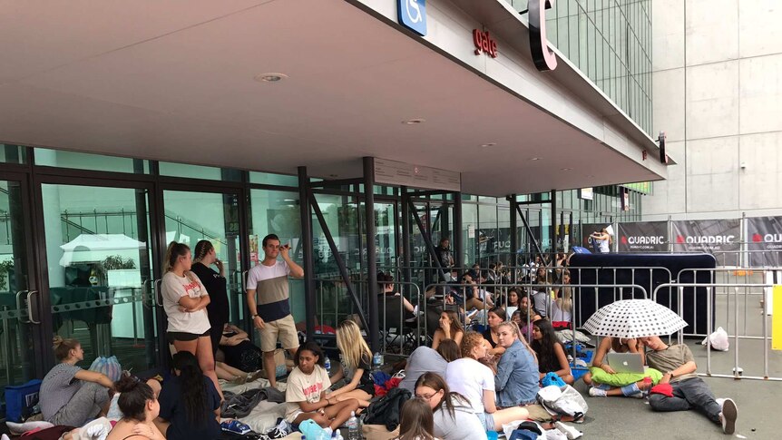 Around 120 fans patiently count down the hours until tonight's Justin Bieber concert.
