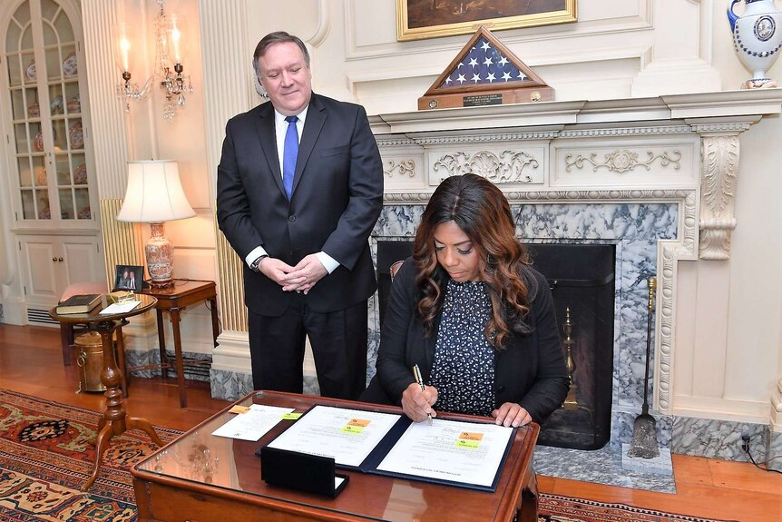 Secretary of State Mike Pompeo officiates the Swearing-In Ceremony for Dr. Kiron Skinner as Director of Policy Planning.