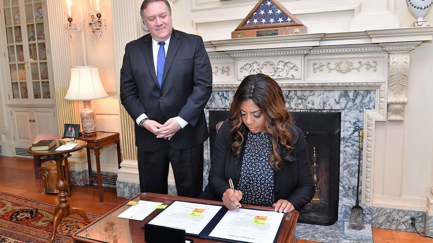 Secretary of State Mike Pompeo officiates the Swearing-In Ceremony for Dr. Kiron Skinner as Director of Policy Planning.