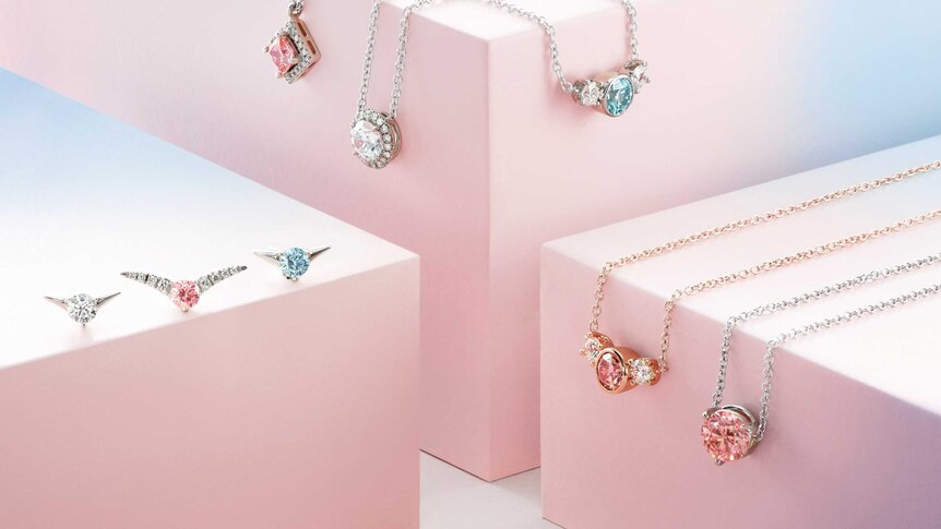 Images of diamond jewellery on the pink boxes