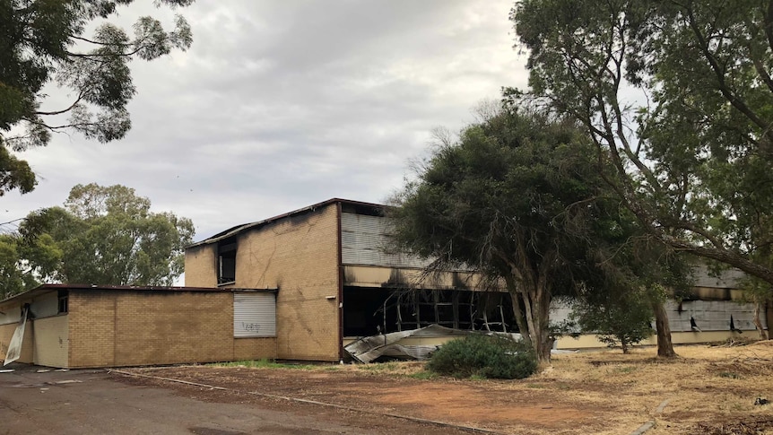 A fire-damaged school building.