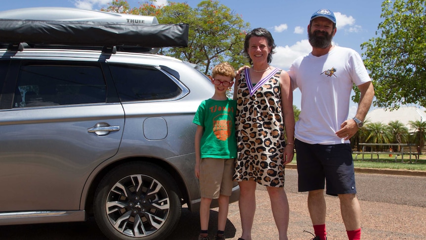 Siobhan Toohill standing with her family in front of the Windorah Pub in south-west Queensland.