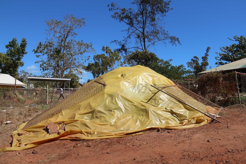 Soil materials covered in yellow sheeting.