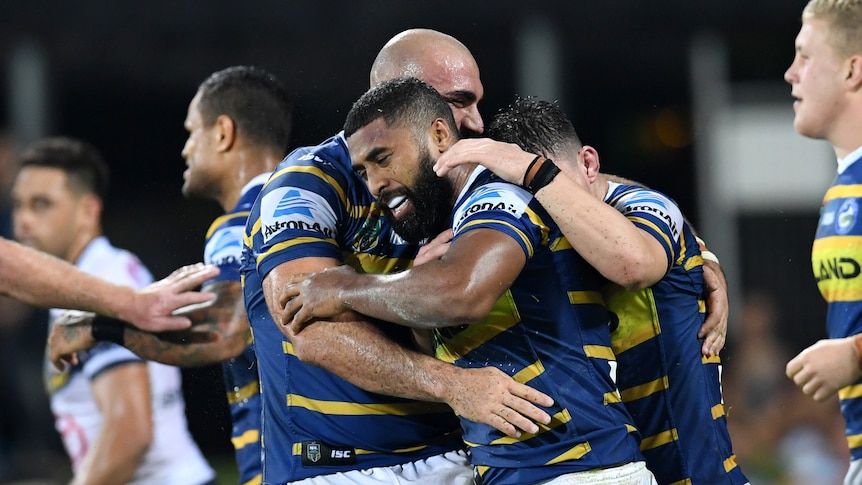 Michael Jennings celebrates try for the Eels against Cowboys