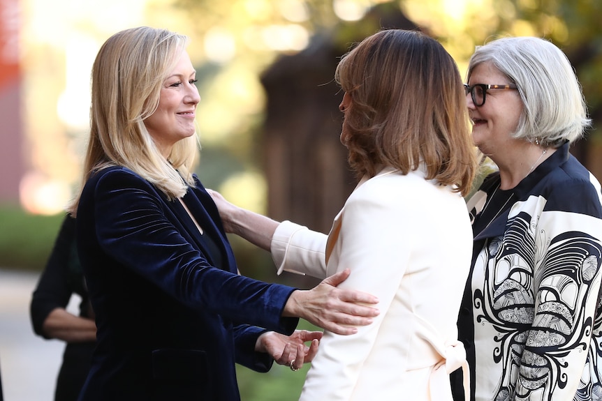 Two women smiling